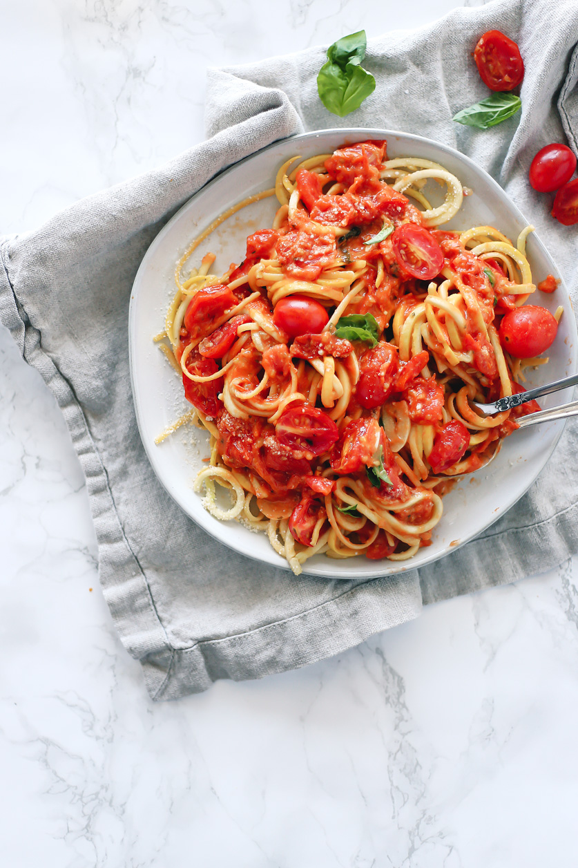 easy, simple, fresh grape tomato sauce by pasta-based. serve over pasta or veggie noodles for a healthy, light dish.