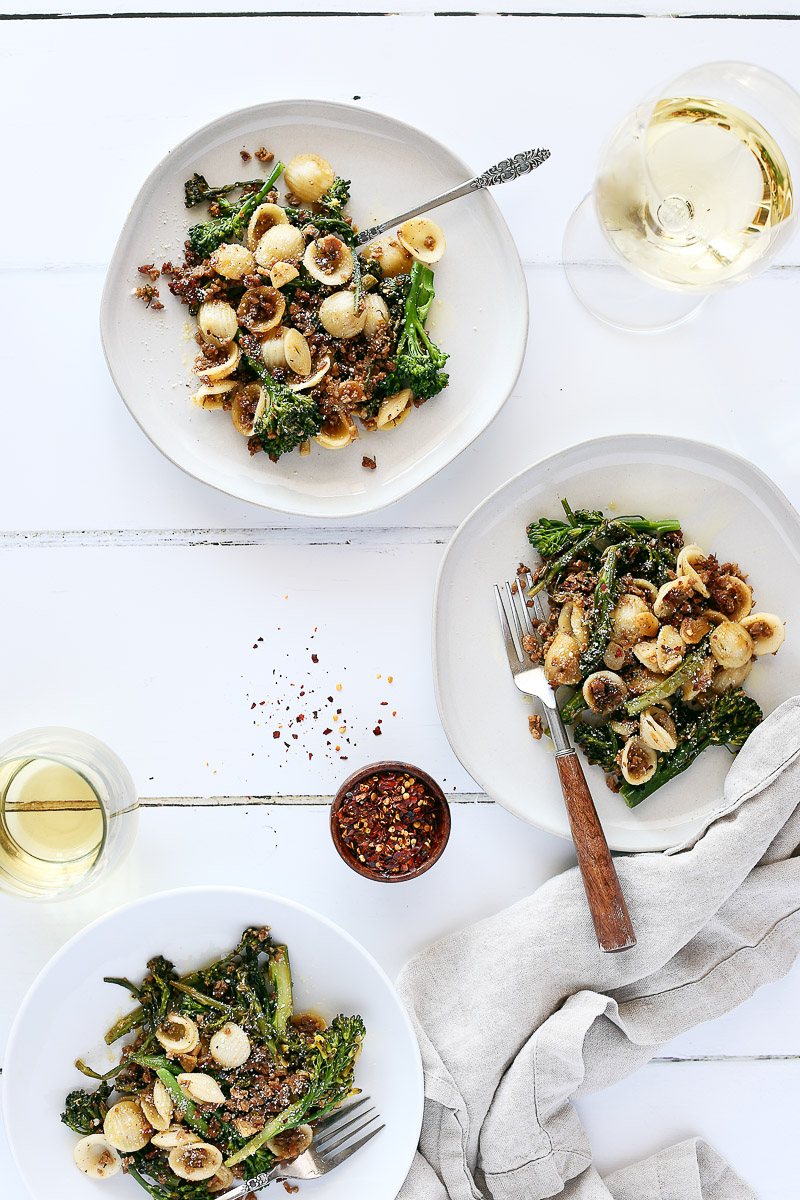 Italian Sausage Crumbles by Pasta-based. A plate of orecchiette pasta mixed with broccolini, vegan sausage crumbles, and fresh browned garlic.