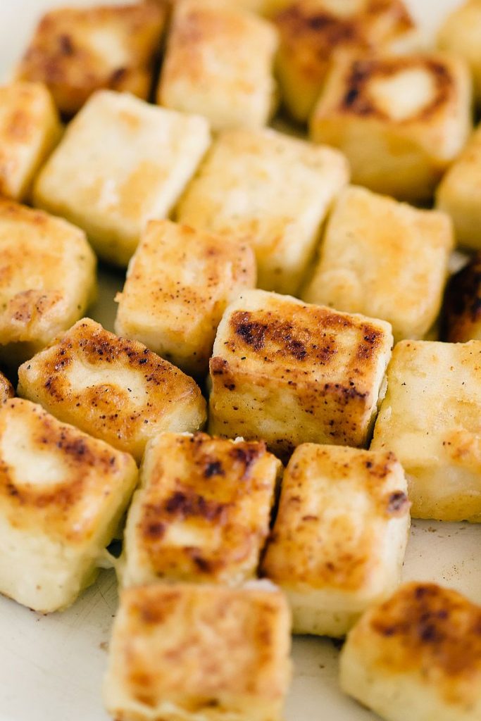 Close up photo of crispy fried tofu.