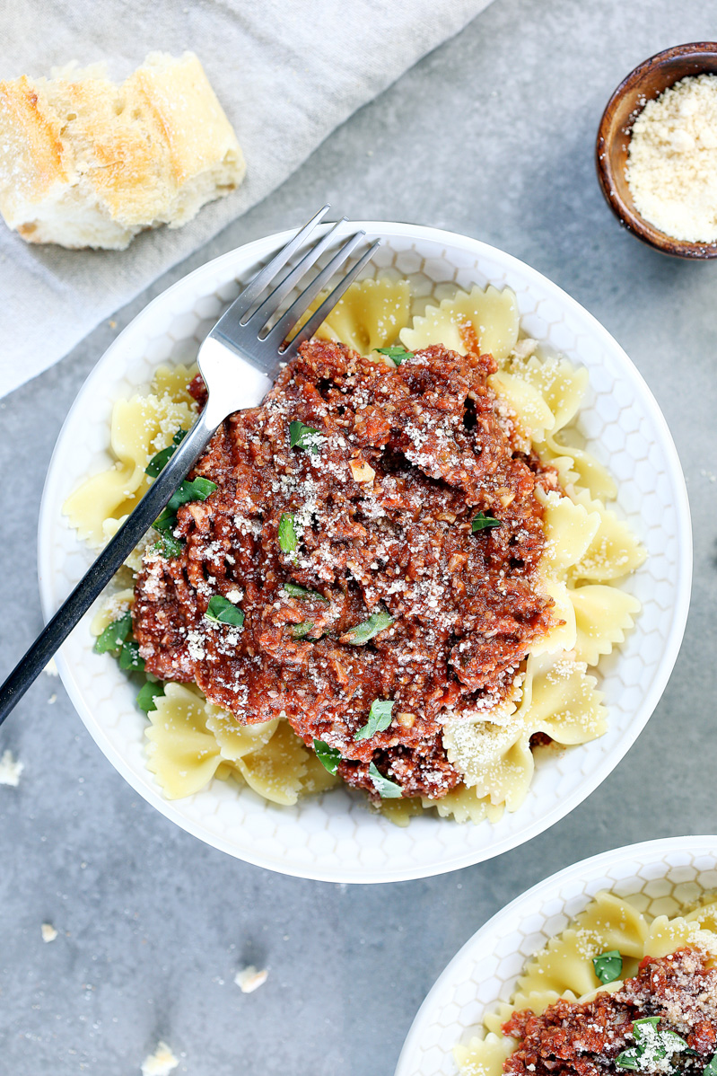 Overhead photo of vegan meat sauce in a white bowl.