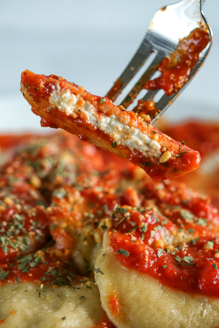 Vegan Ravioli smothered in marinara sauce