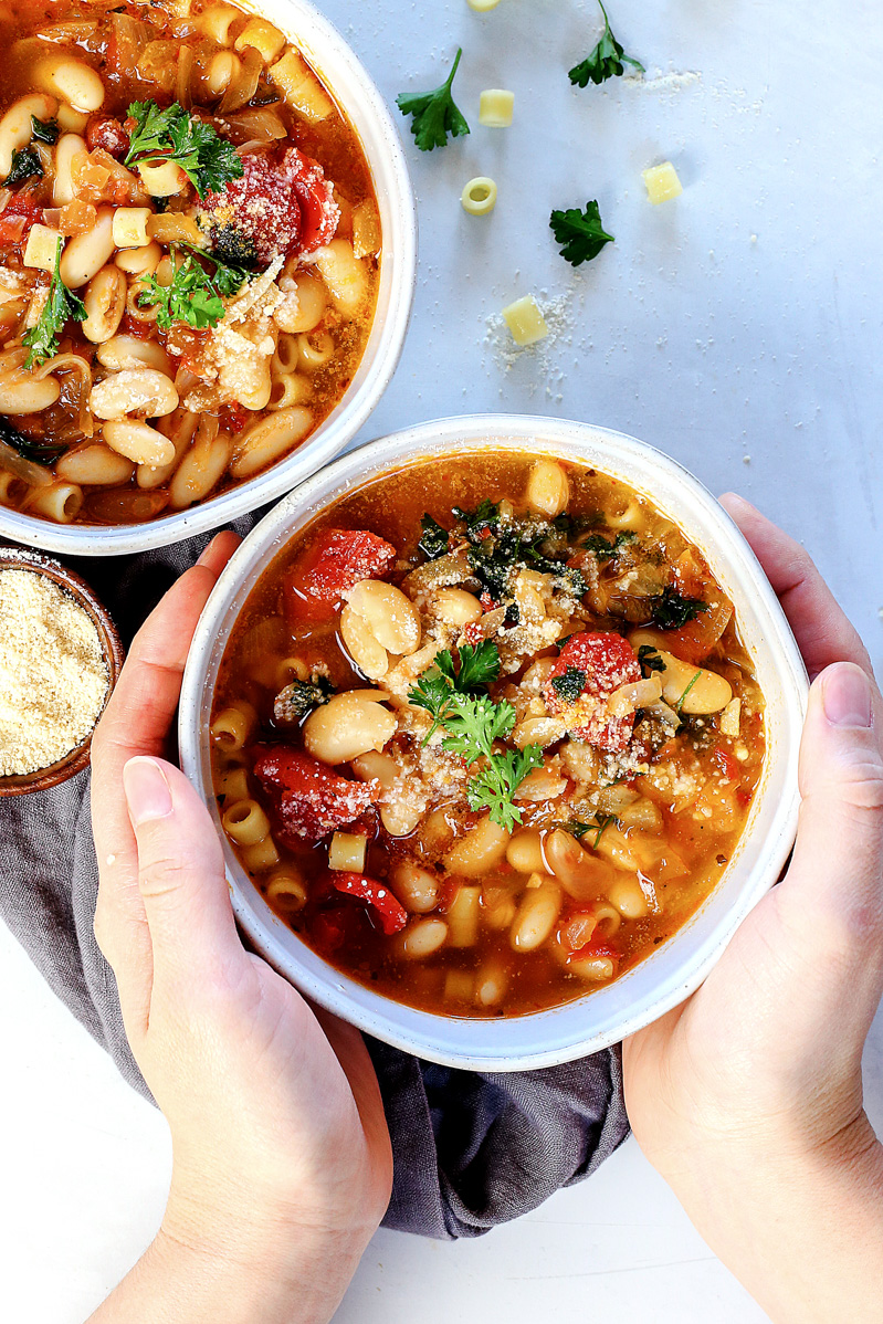 Pasta Fagioli by Pasta-based. White beans, ditalini pasta, fresh parsley, fresh marinara sauce, onions and garlic in vegetable broth makes this warm, hearty soup perfect for January.