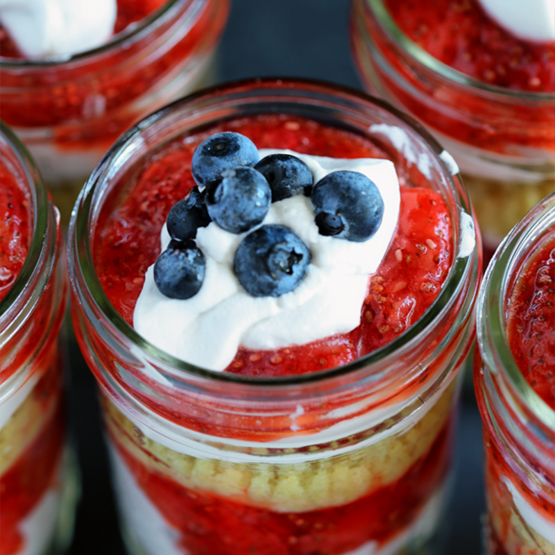 Vegan Strawberry Shortcake Mason Jars topped with Blueberries by Pasta-based.